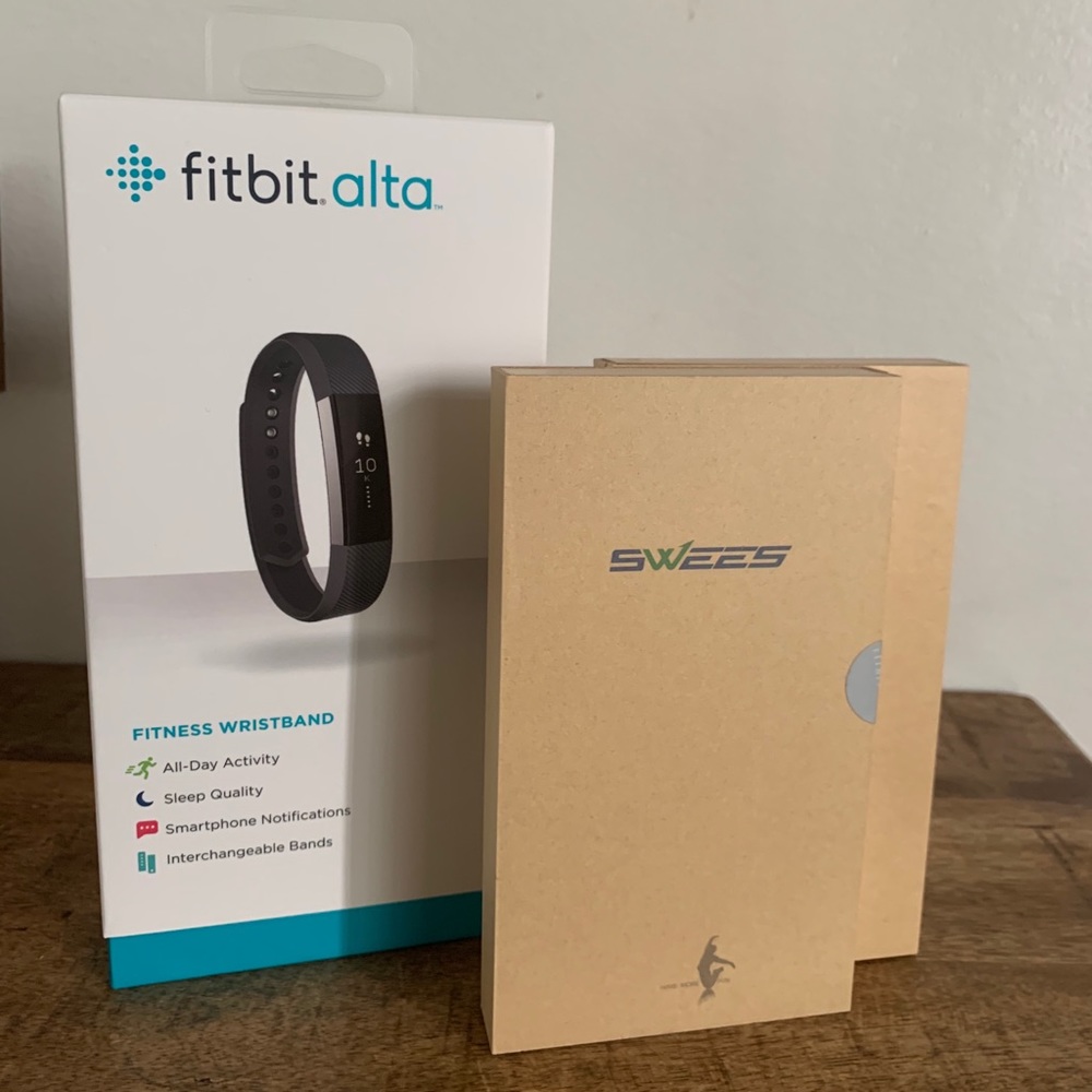 Fitbit Alta in box with 2 mesh arm bands